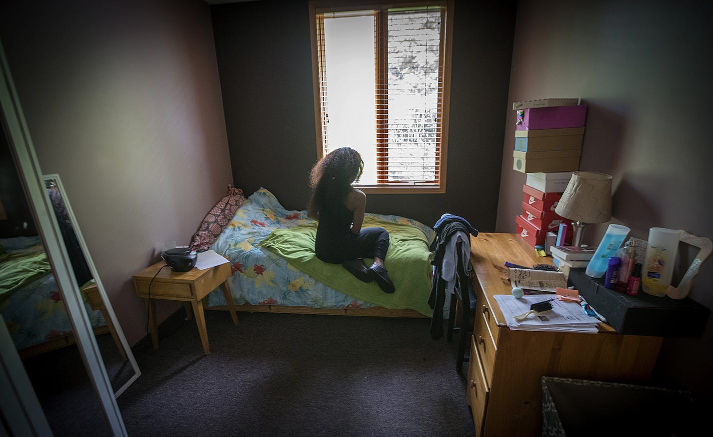 A young sex-trafficking victim sat in her room between classes at the Link's Passageways Shelter and Housing Program, Friday, May 26, 2017 in Prior Lake, MN. ] ELIZABETH FLORES &#xef; liz.flores@startribune.com