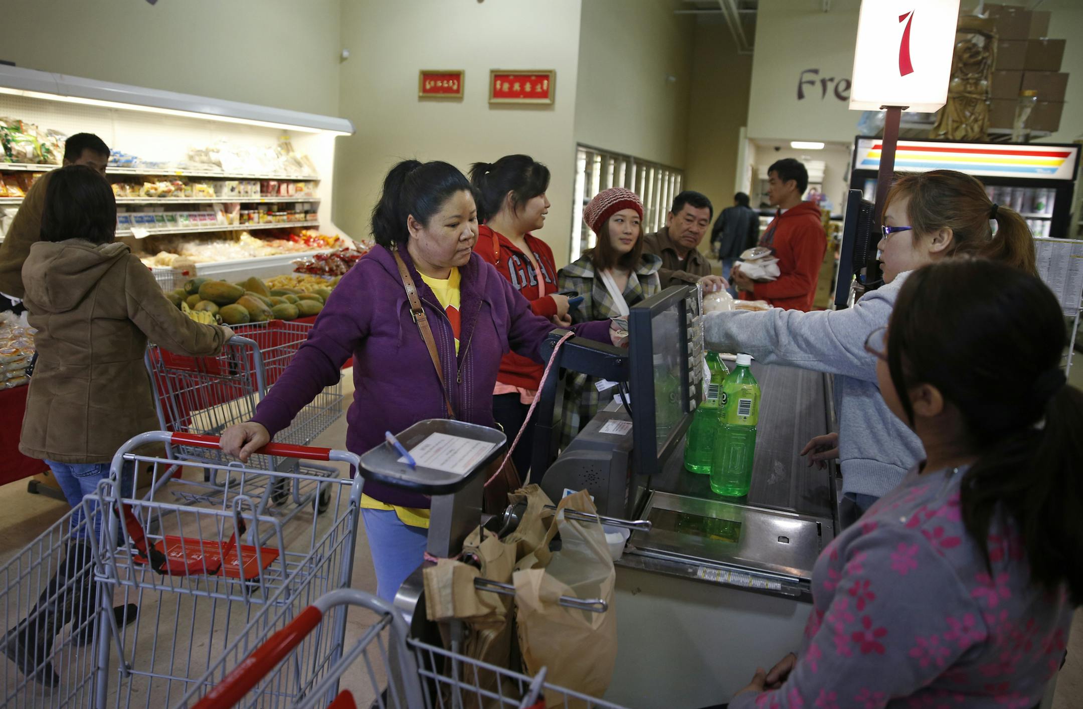 Shoppers were busy picking up Asian grocery items at the Golden Lion Supermarket in Brooklyn Park.