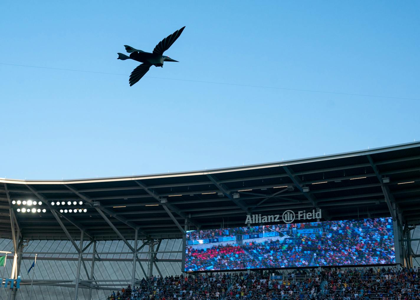 A mechanical loon flies over the crowd during the opening ceremony at the MLS All-Star Game against LIGA MX Aug. 10, 2022 at Allianz Field in St. Paul, Minn.