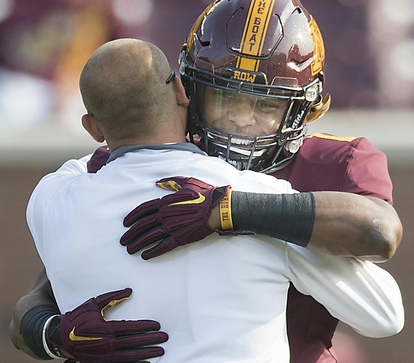 Minnesota Head Coach P.J. gave a hug to Minnesota's running back Rodney Smith before the Gophers took on the Buffalo Bulls at TCF Bank Stadium, Thursday, August 31, 2017 in Minneapolis, MN. ] ELIZABETH FLORES &#xef; liz.flores@startribune.com