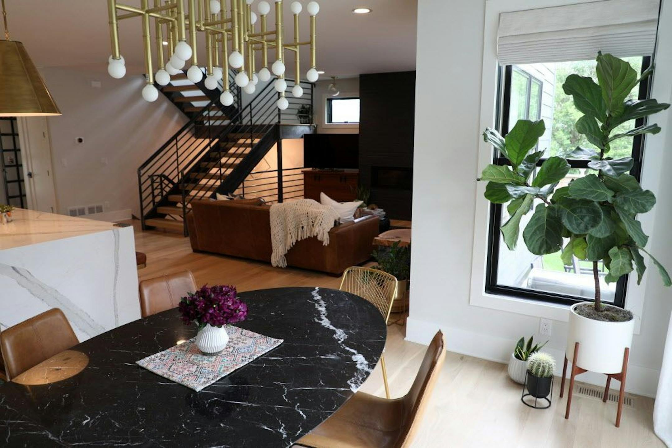 The dining room is open to the living room and kitchen.