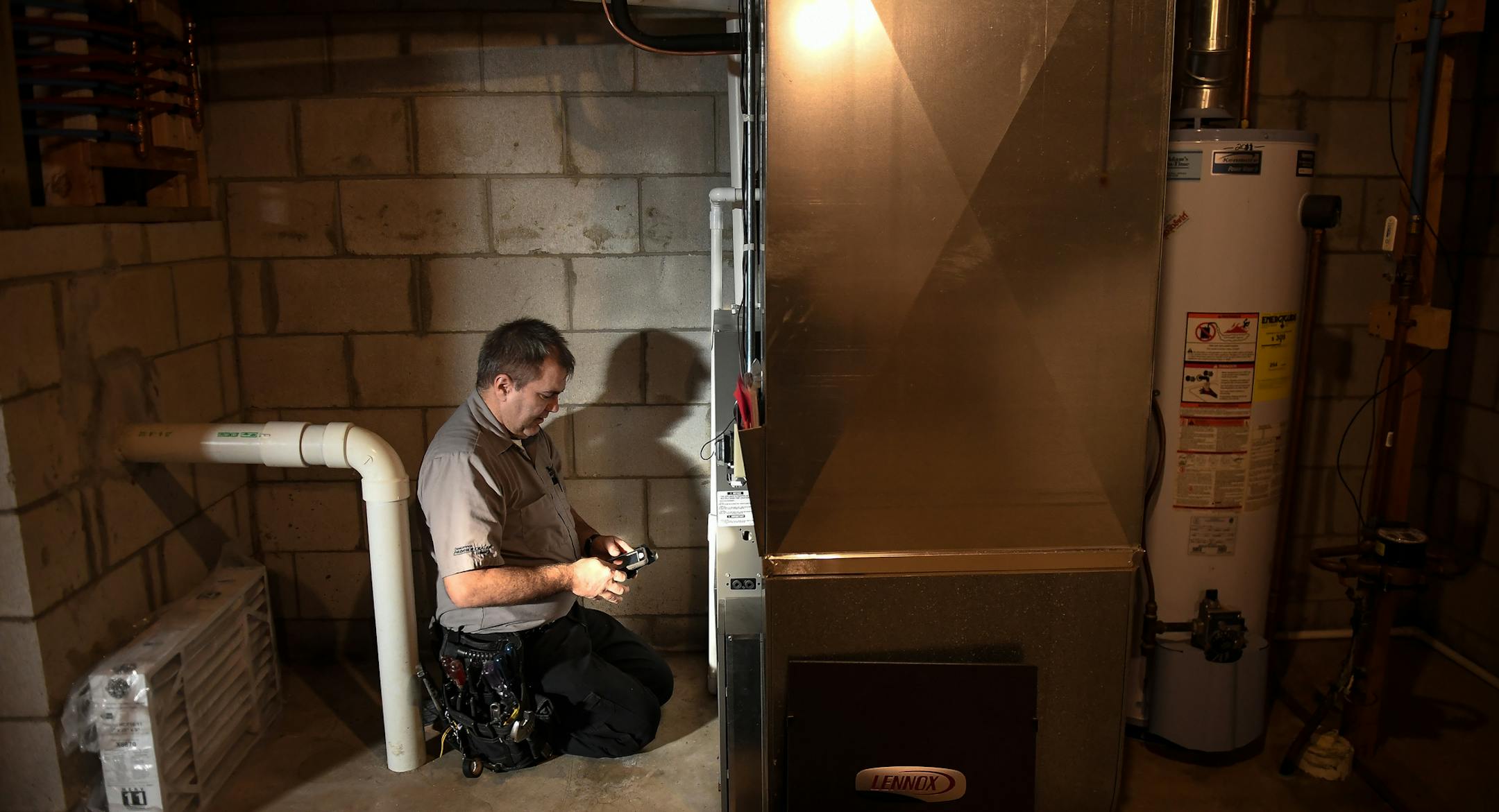 Michael Engel, with Marsh Heating and Air Conditioning, begins his inspection on the heater of Cody Lewandowski Thursday afternoon. ] AARON LAVINSKY • aaron.lavinsky@startribune.com It's furnace tune-up season, but the $59 tuneup can sometimes become a red tag special. Unscrupulous HVAC contractors sometimes lowball the tuneup and then shut it down (red tagging it) because of a cracked heat exchanger. Smart consumers get a second opinion. We photograph Michael Engel as he inspects the hea