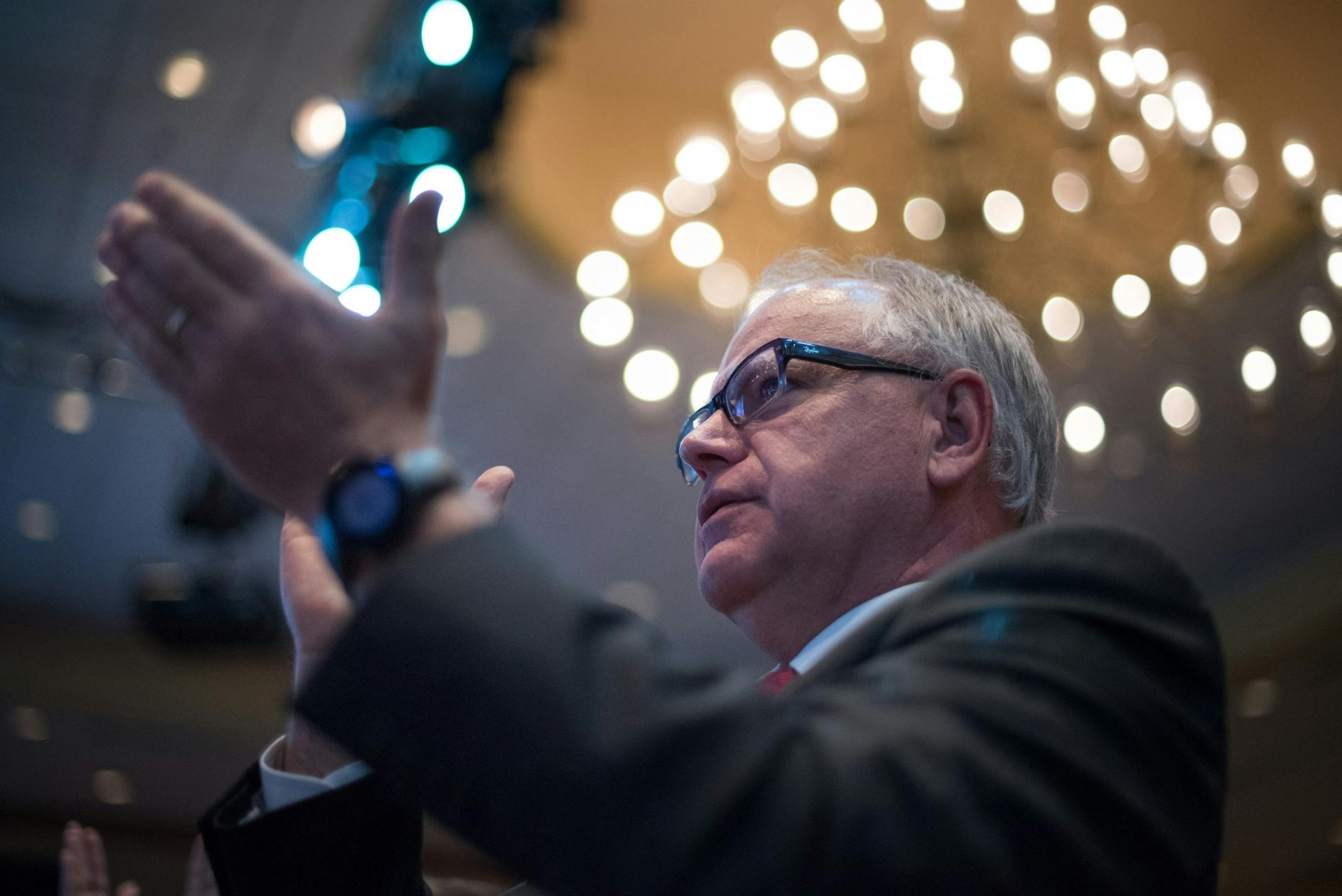 Minnesota U.S. Congressman Tim Walz applauded as Hilary Clinton was introduced at the DNC.