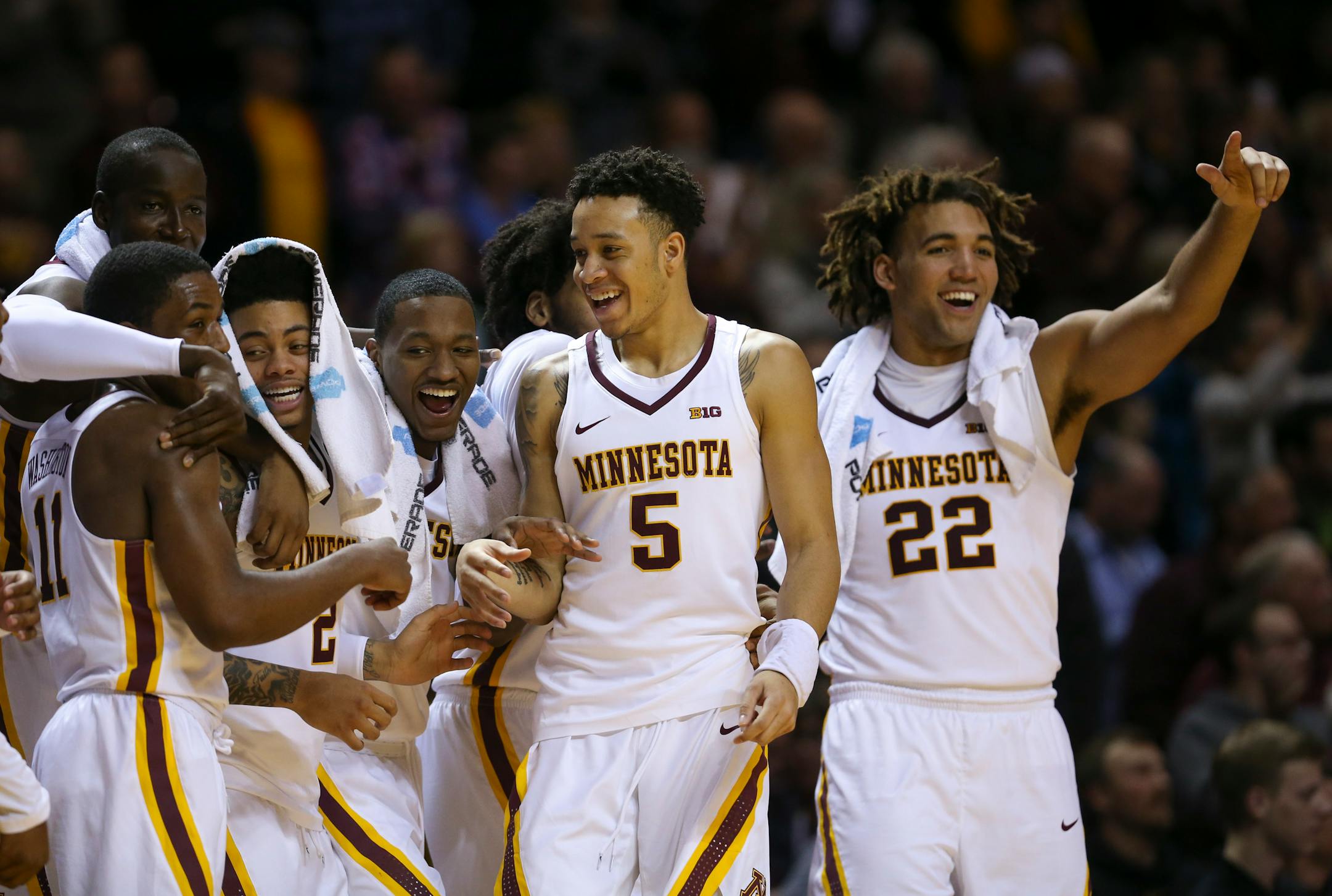 Gophers (from left) Isaiah Washington, Bakary Konate, Nate Mason, Dupree McBrayer, Amir Coffey, and Reggie Lynch celebrated a dominating 100-57 victory over Alabama A&M at Williams Arena on Tuesday night.