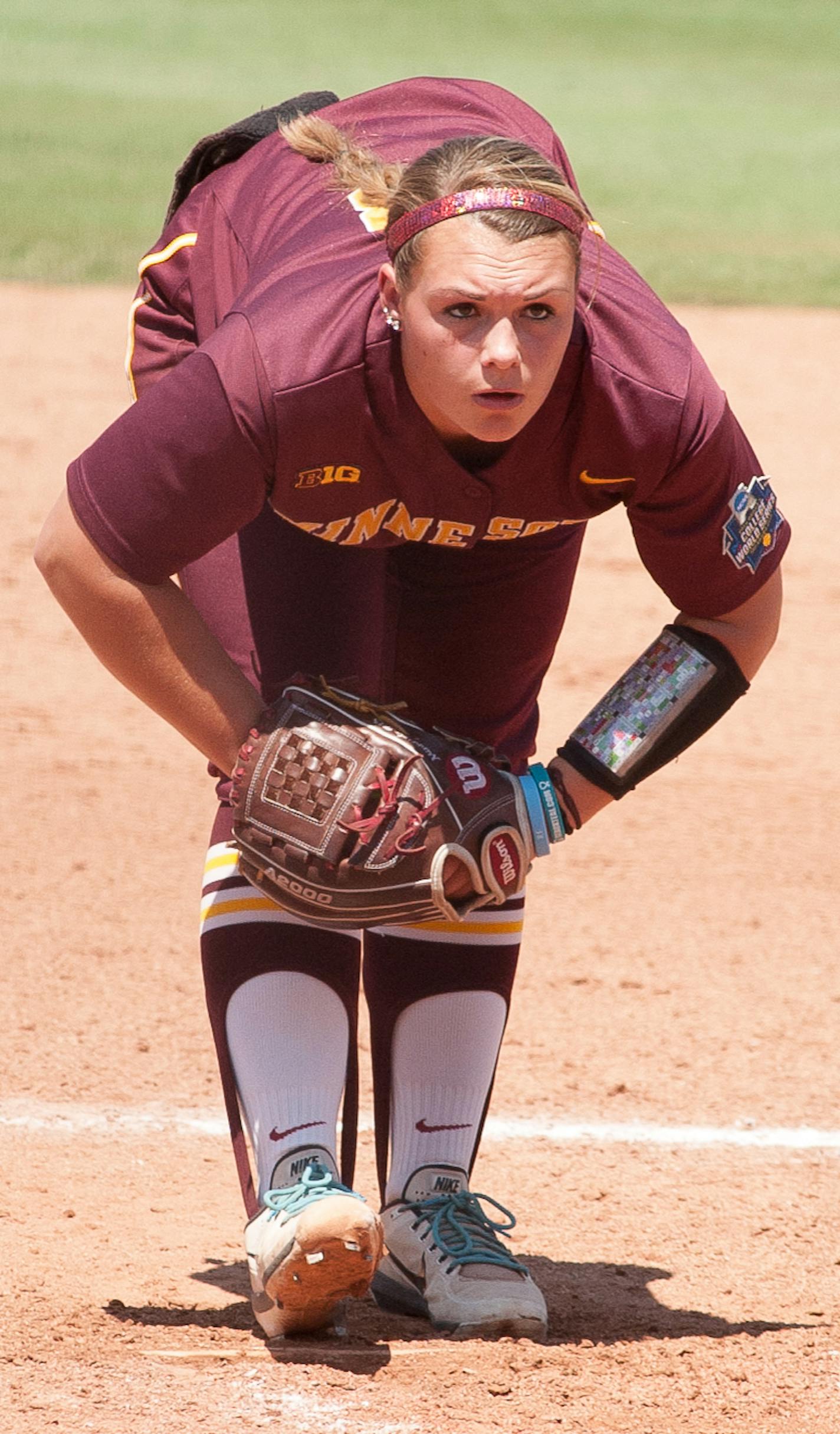 Minnesota pitcher Amber Fiser eyeing the mitt versus UCLA at the 2019 Women's College World Series at the Softball Hall of Fame in Oklahoma City ORG XMIT: TP101