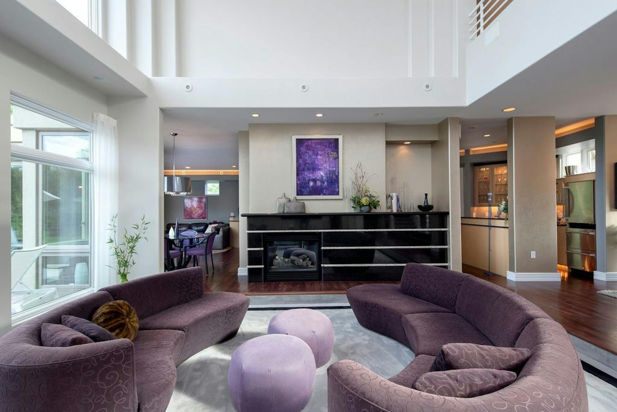 The living room includes a fireplace, one of three in the home.
