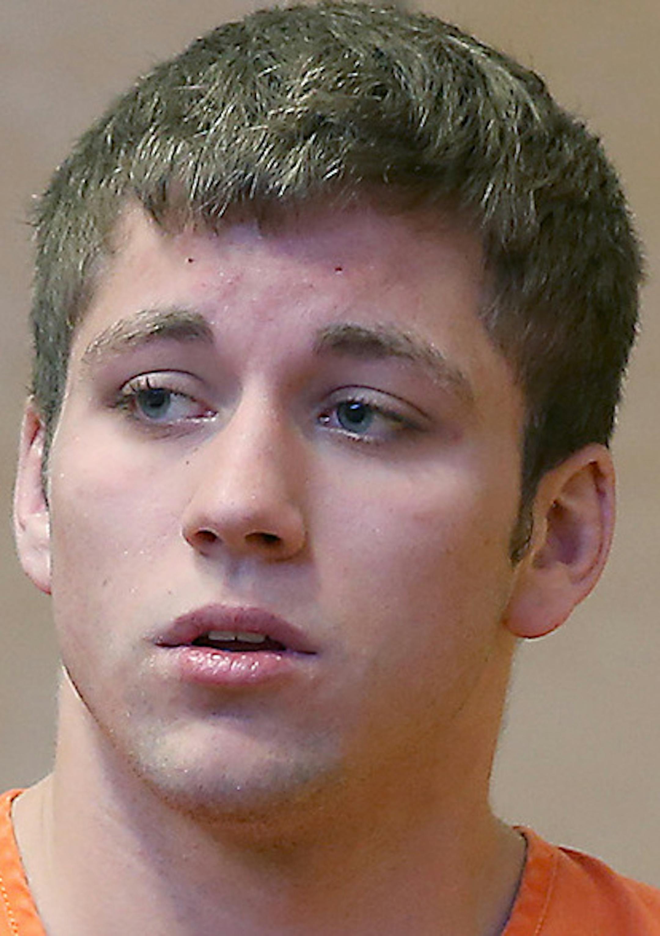 Nineteen-year-old Levi Acre-Kendall made his way into the Polk County Justice Center, Wednesday, April 22, 2015 in Balsam Lake, WI. Acre-Kendall is charged with fatally stabbing Peter Kelly in the heart after the men's two groups of friends engaged in a three-hour long dispute while fishing. ] (ELIZABETH FLORES/STAR TRIBUNE) ELIZABETH FLORES • eflores@startribune.com
