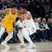 Gophers guard Cam Christie (24) averaged 11.3 points per game and made the Big Ten's All-Freshman team this season, but he is considering his pro opti