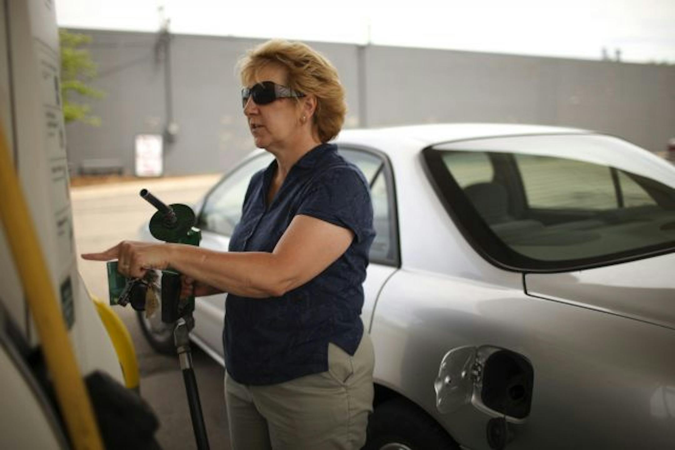 Doreen Gardeen of Bloomington filled up her car at Colonial BP in Bloomington Friday afternoon. She said she would continue to buy gas there because it is locally owned and she's loyal to the mechanics there.