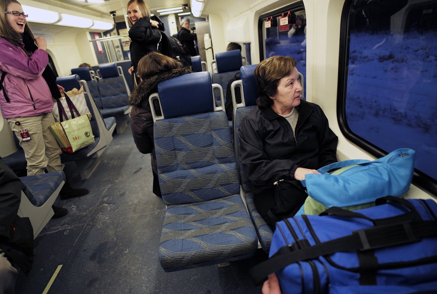 On the Northstar train, Jane Huikko, of Zimmerman, far right, is returning home from a trip to Arizona. They found it a good way to travel and save on parking.