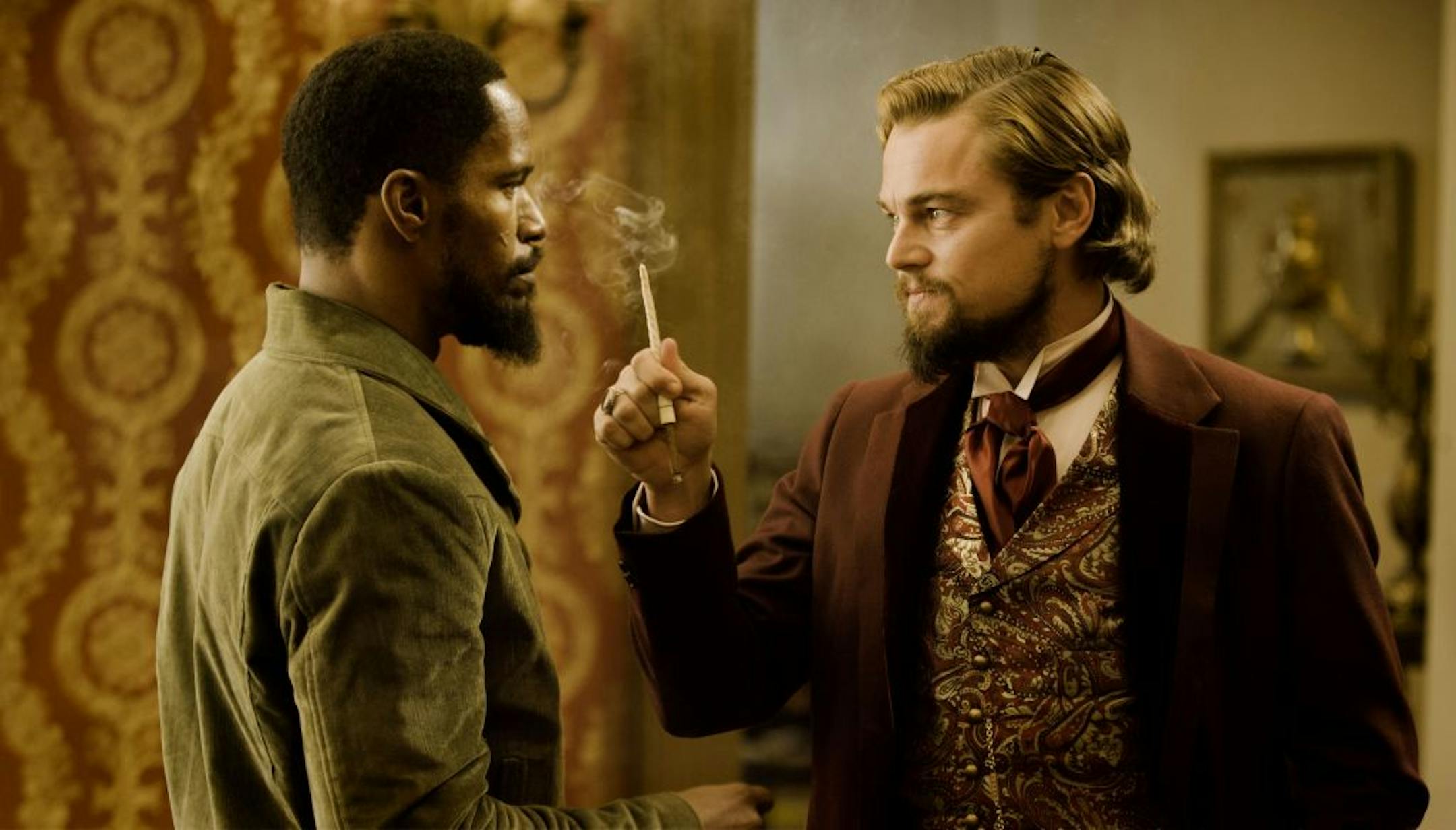 In this undated publicity photo released by The Weinstein Company, from left, Jamie Foxx as Django and Leonardo DiCaprio as Calvin Candle star in the film, "Django Unchained," directed by Quentin Tarantino.