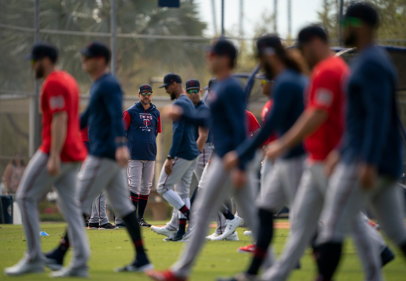 Twins manager Rocco Baldelli watched his players during warmups at Hammond Stadium in Fort Myers, Florida Monday, March 14, 2022. After some late night roster moves, the Twins full squad reported to Spring Training for Monday's workout. ] JEFF WHEELER • Jeff.Wheeler@startribune.com