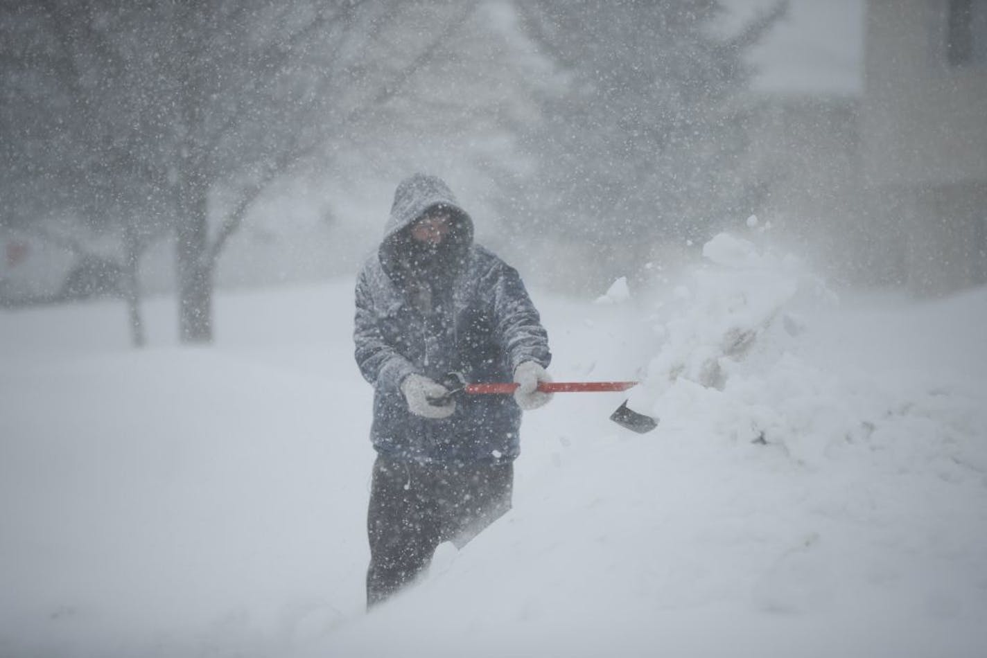 Skylar Milne thought he'd try to get ahead of the falling snow and clear his driveway in Elko New Market.