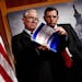Sen. Jeff Sessions (R-Ala.) and Sen. John Barrasso (R-Wyo.) look at a copy of the 2013 budget.