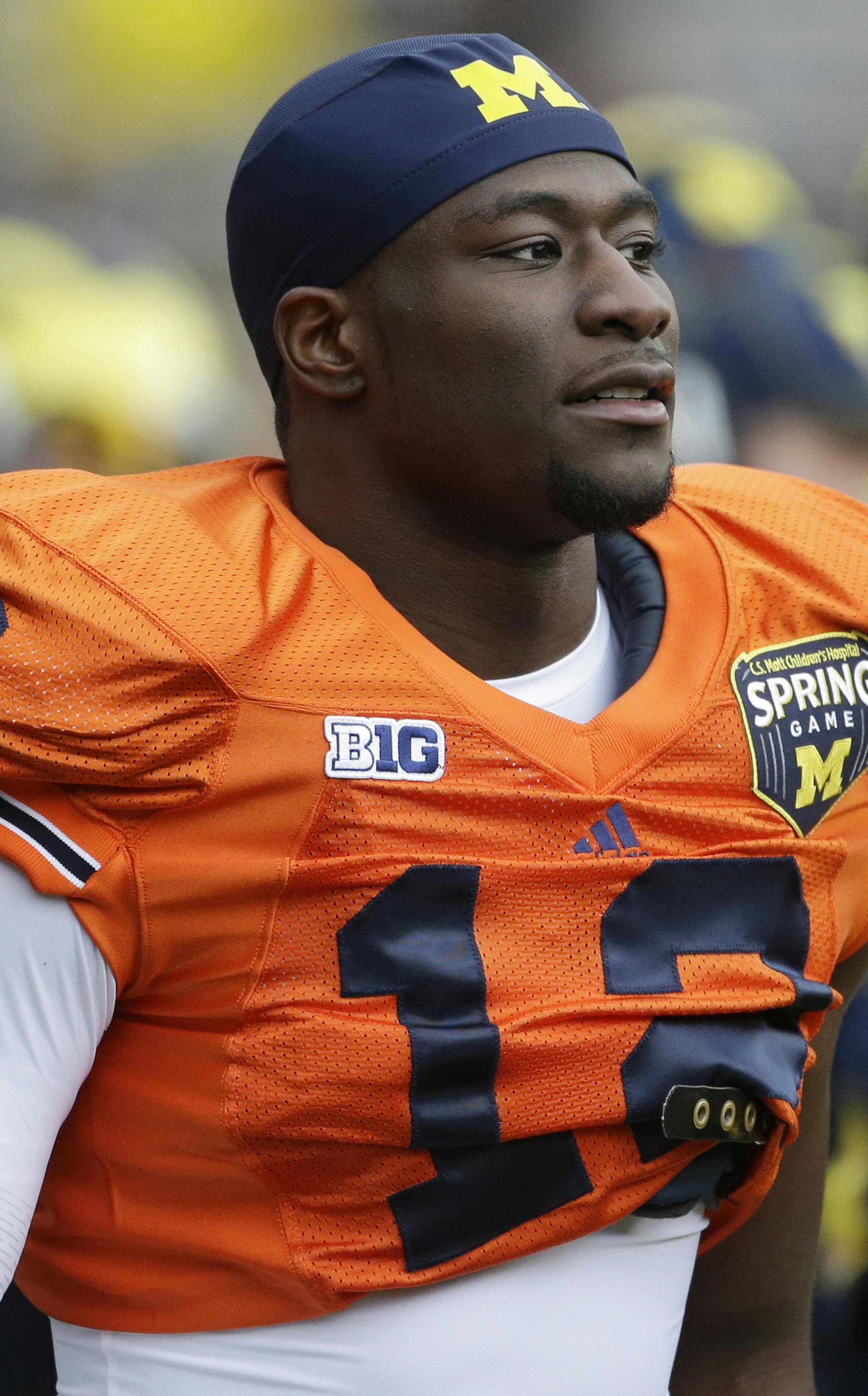 Michigan quarterback Devin Gardner looks from the sidelines during an NCAA college football spring scrimmage in Ann Arbor, Mich., Saturday, April 13, 2013. (AP Photo/Carlos Osorio) ORG XMIT: MIN2013042219300430
