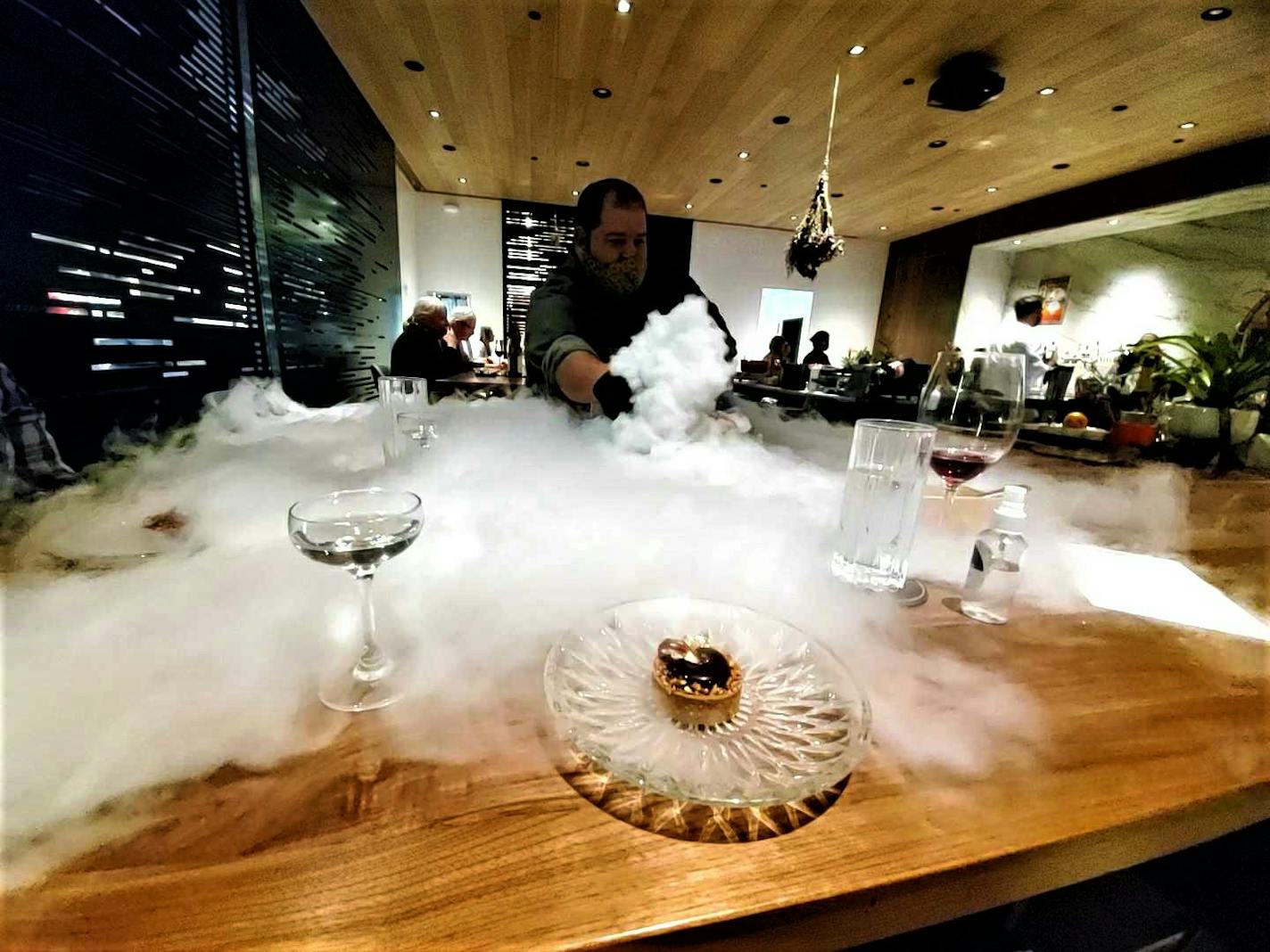 Chef Mike Brown makes a smoky effect for the dessert course at Travail's new multi-course tasting dinner, A New Hope.