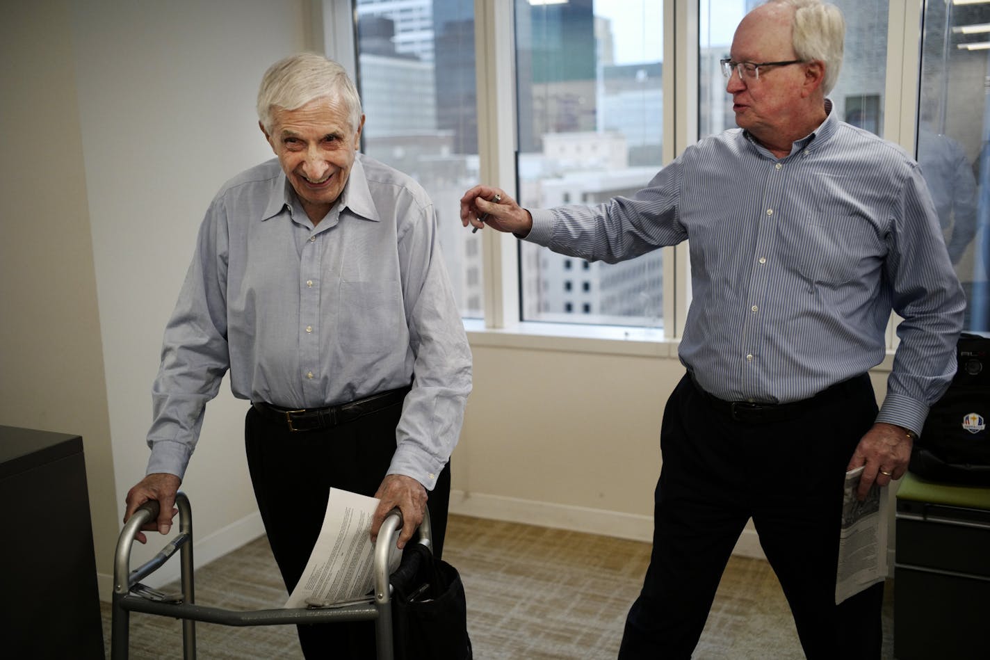 Sports editor Glen Crevier gives columnist Sid Hartman the good news that he will be inducted in the Minnesota Sports Hall of Fame. ] Richard Tsong-Taatarii&#x2022;Richard.Tsong-Taatarii@startribune.com