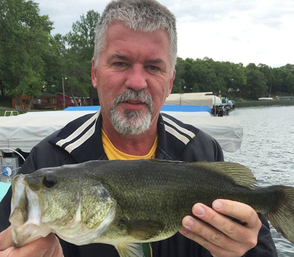 TRUE BELIEVER Joe Tanner of Brooklyn Park caught and released this 3.5-pound largemouth bass on Lake Miltona this month. "My friend suggested I try a 