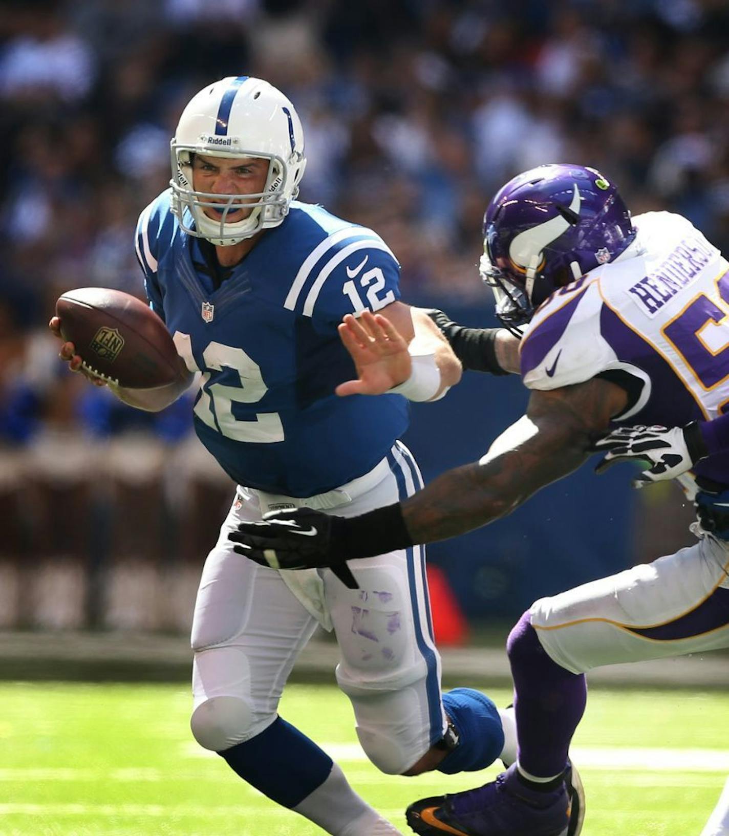 Indianapolis Colts quarterback Andrew Luck was sacked by Minnesota Vikings outside linebacker Erin Henderson.