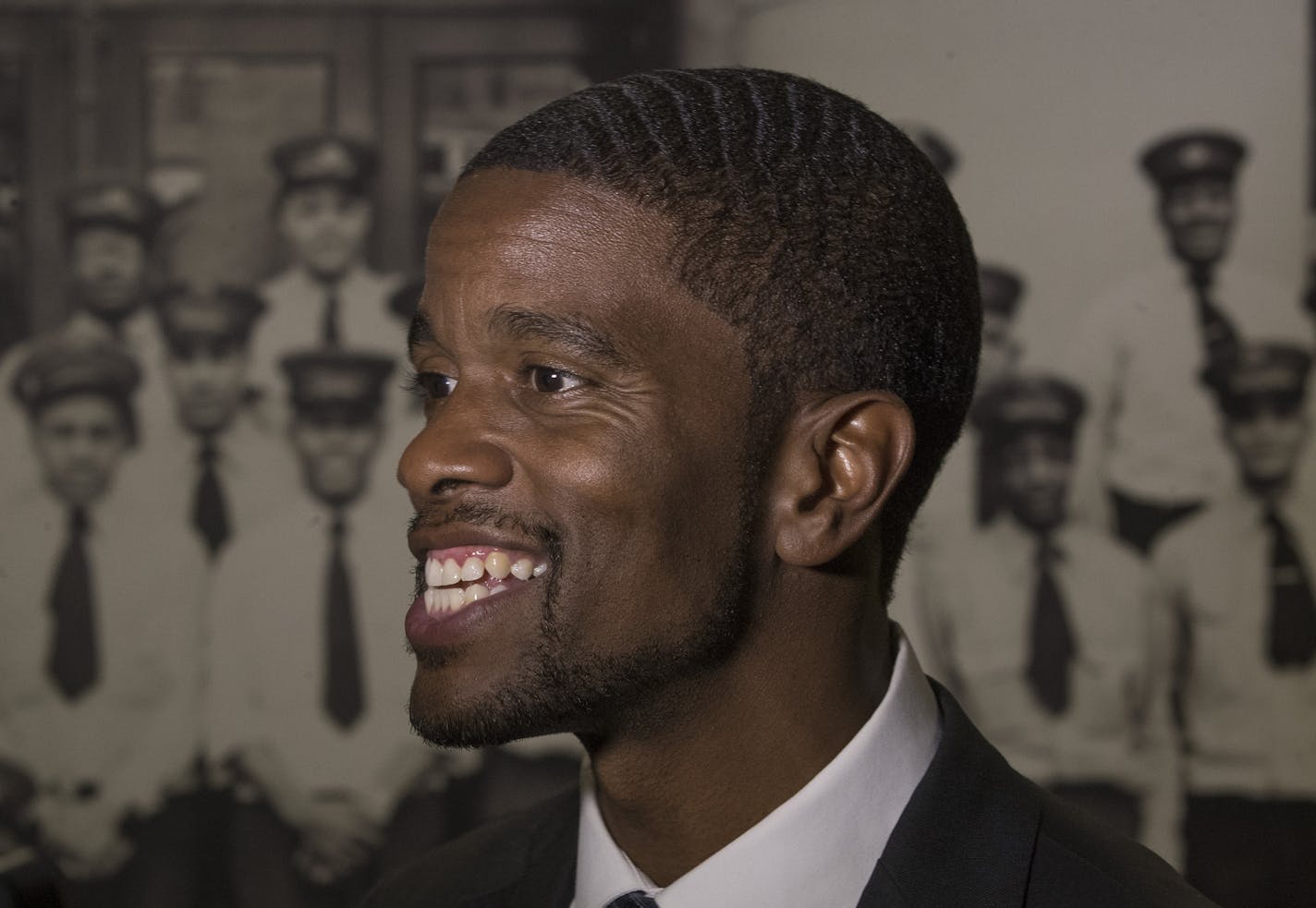 Melvin Carter became the first African American to win as mayor of St. Paul . Carter stood in front of a photograph of members of the Red Caps at the Union Depot Tuesday November 7,2017 in St. Paul, MN.] JERRY HOLT &#xef; jerry.holt@startribune.com