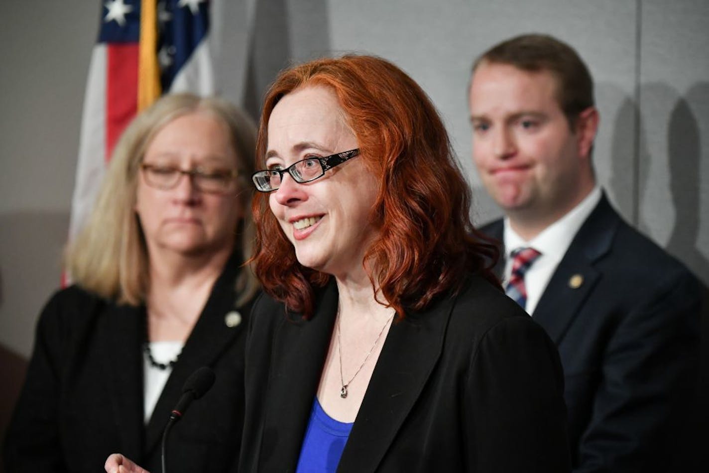 NAMI director Sue Abderholden and bill sponsor Rep. Nick Zerwas, R-Elk River listened as Sharon Rolenc spoke of her son's ordeal spending 341 days in solitary confinement.