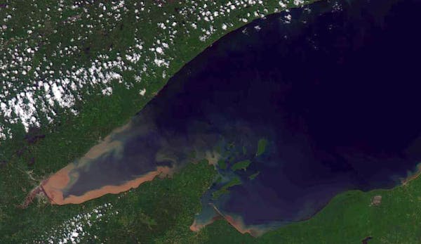 A satelite view of Lake Superior and the sediment that washed into the lake near Duluth after last June's 10-inch rainstorm. ORG XMIT: MIN201306271618
