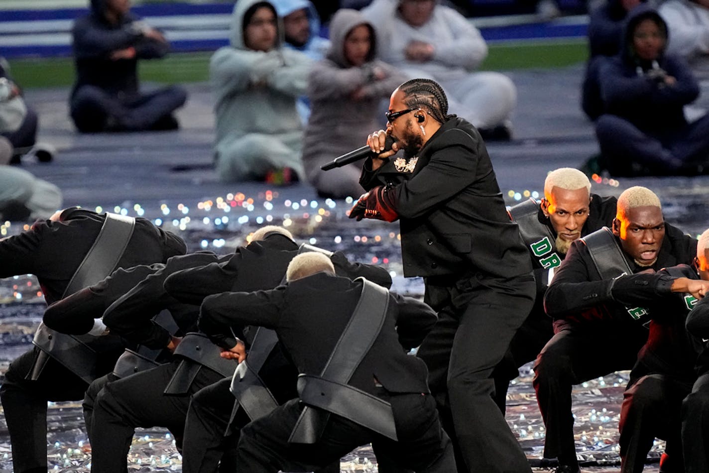 Kendrick Lamar performs during halftime of the NFL Super Bowl 56 football game between the Los Angeles Rams and the Cincinnati Bengals, Sunday, Feb. 13, 2022, in Inglewood, Calif. (AP Photo/Ted S. Warren)