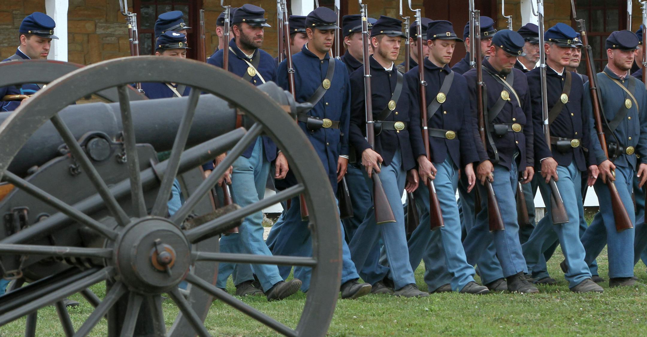 Members of the 1st Minnesota Volunteer Infantry marched in the parade field during a infantry drill and musket firing demonstration at Fort Snelling during the Civil War Weekend on 8/18/12. The First Regiment of Minnesota Volunteer Infantry is a non-profit organization founded in 1973 to honor the memory and teach the history of the civil war unit. The Fort Snelling weekend event allowed visitors to travel back to the 1860s and experience life at the frontier fort during the Civil War. Costumed