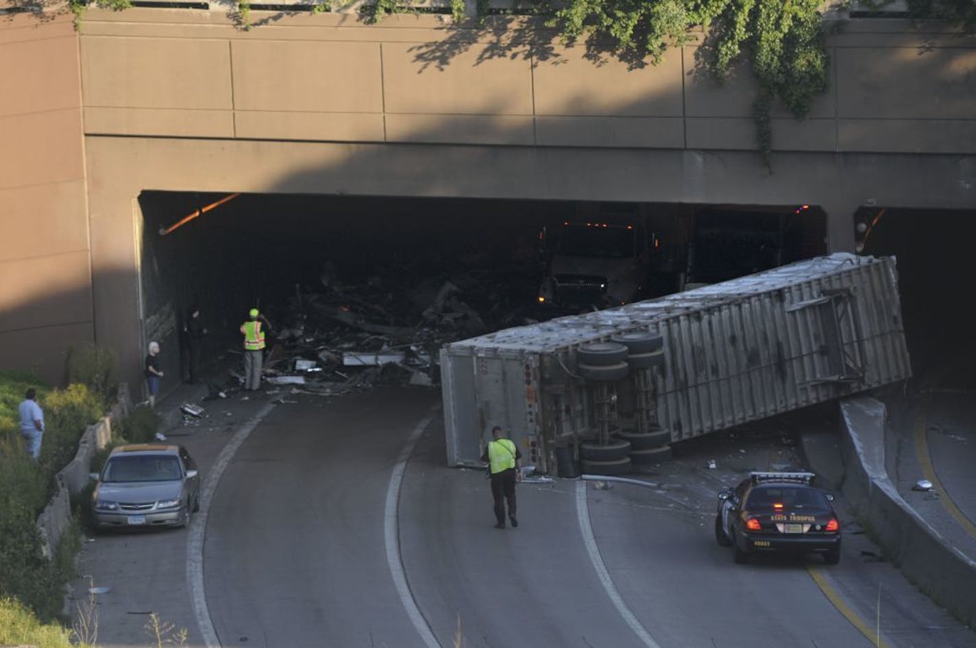 A tractor trailer truck crashed and is blocking the eastbound lane of I-94 at the Lowry Hill Tunnel on Wednesday August 10 2011 in Minneapolis, Minn