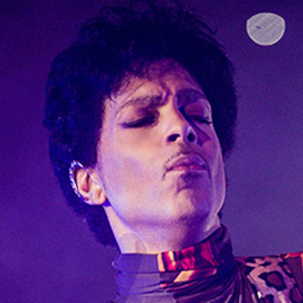 This Fall 2012 publicity photo provided by Rogers and Cowan shows musician Prince performing in concert in Chicago. Prince turns off the lights at Sou