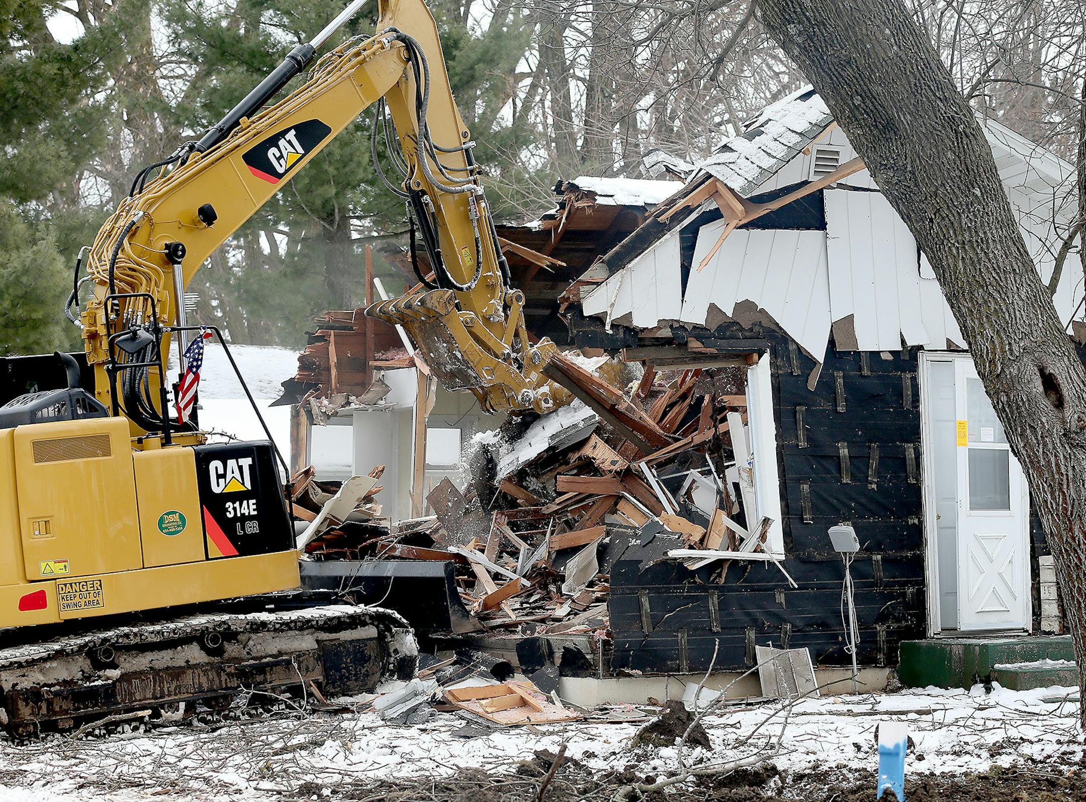 Crew demolished the one-bedroom house on the corner lot that once belonged to Danny Heinrich, Jacob Wetterling's killer, from the city of Annandale, Friday, December 23, 2016. ] (ELIZABETH FLORES/STAR TRIBUNE) ELIZABETH FLORES • eflores@startribune.com
