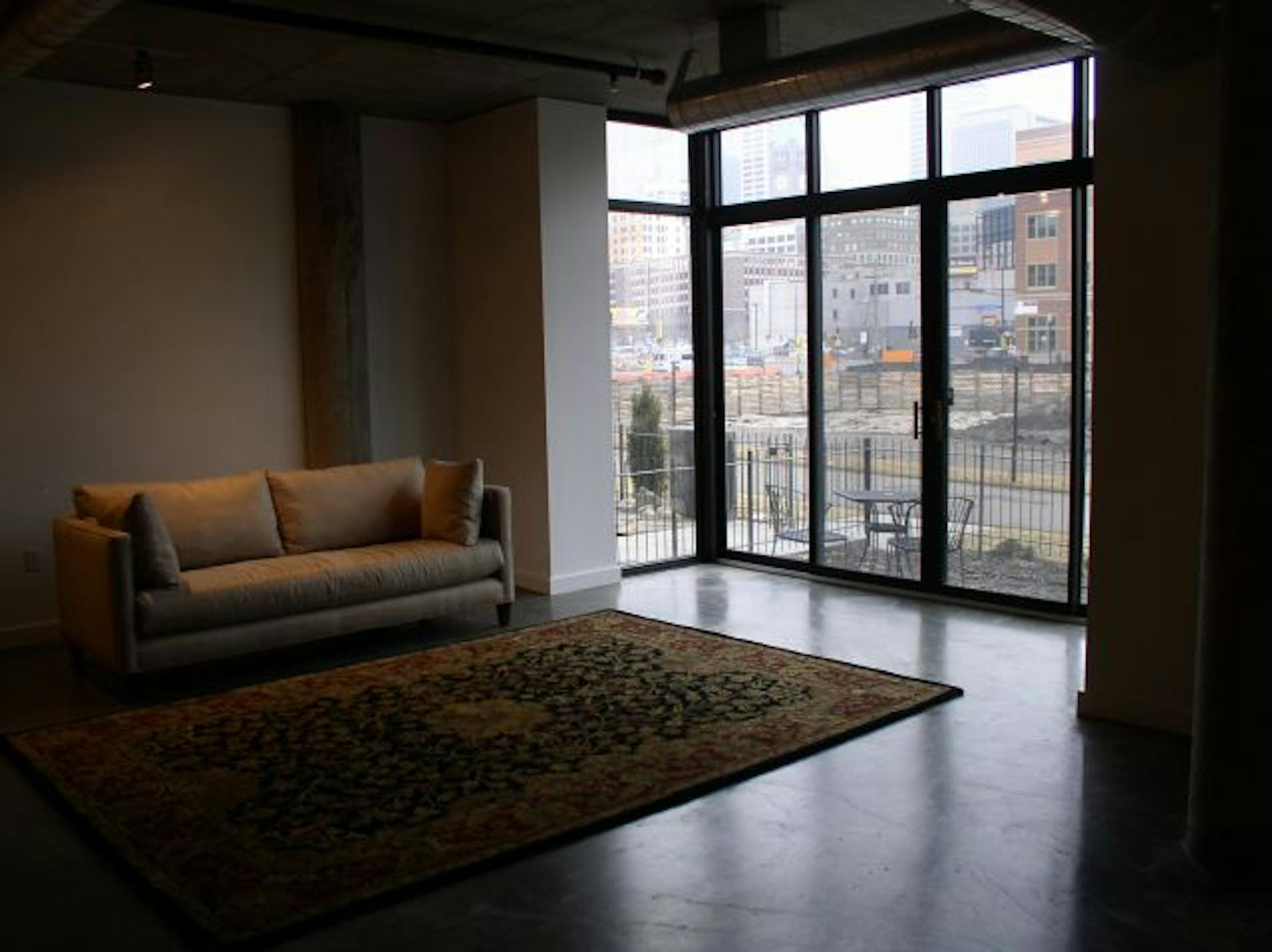 Before: The two-story loft had an open 1,200-square-foot ground floor.