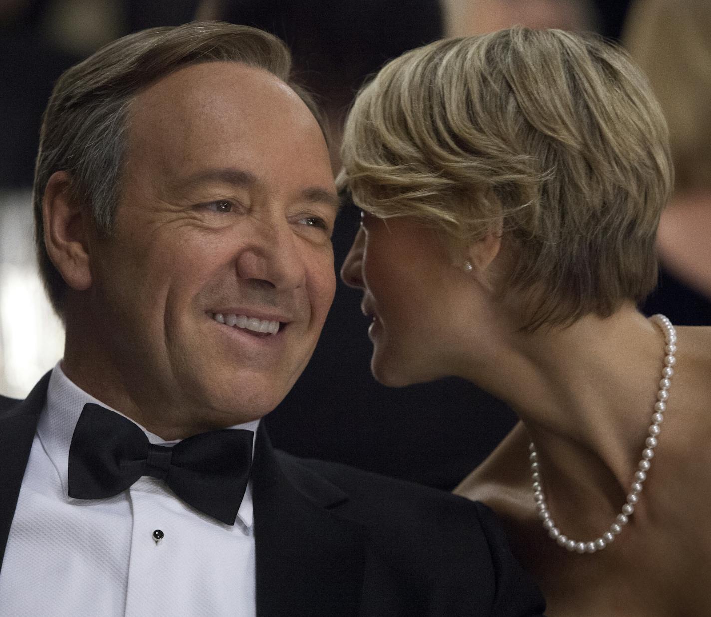 This image released by Netflix shows Kevin Spacey as U.S. Congressman Frank Underwood, left, and Robin Wright as Claire Underwood in a scene from the Netflix original series, "House of Cards." The new original series arrived in one big helping _ all 13 episodes of its first season _ on the subscription streaming service on Friday, Feb. 1, 2013, for viewers to enjoy, at their leisure, in the weeks, months or even years to come. (AP Photo/Netflix, Melinda Sue Gordon) (AP Photo/Netflix) ORG XMIT: M