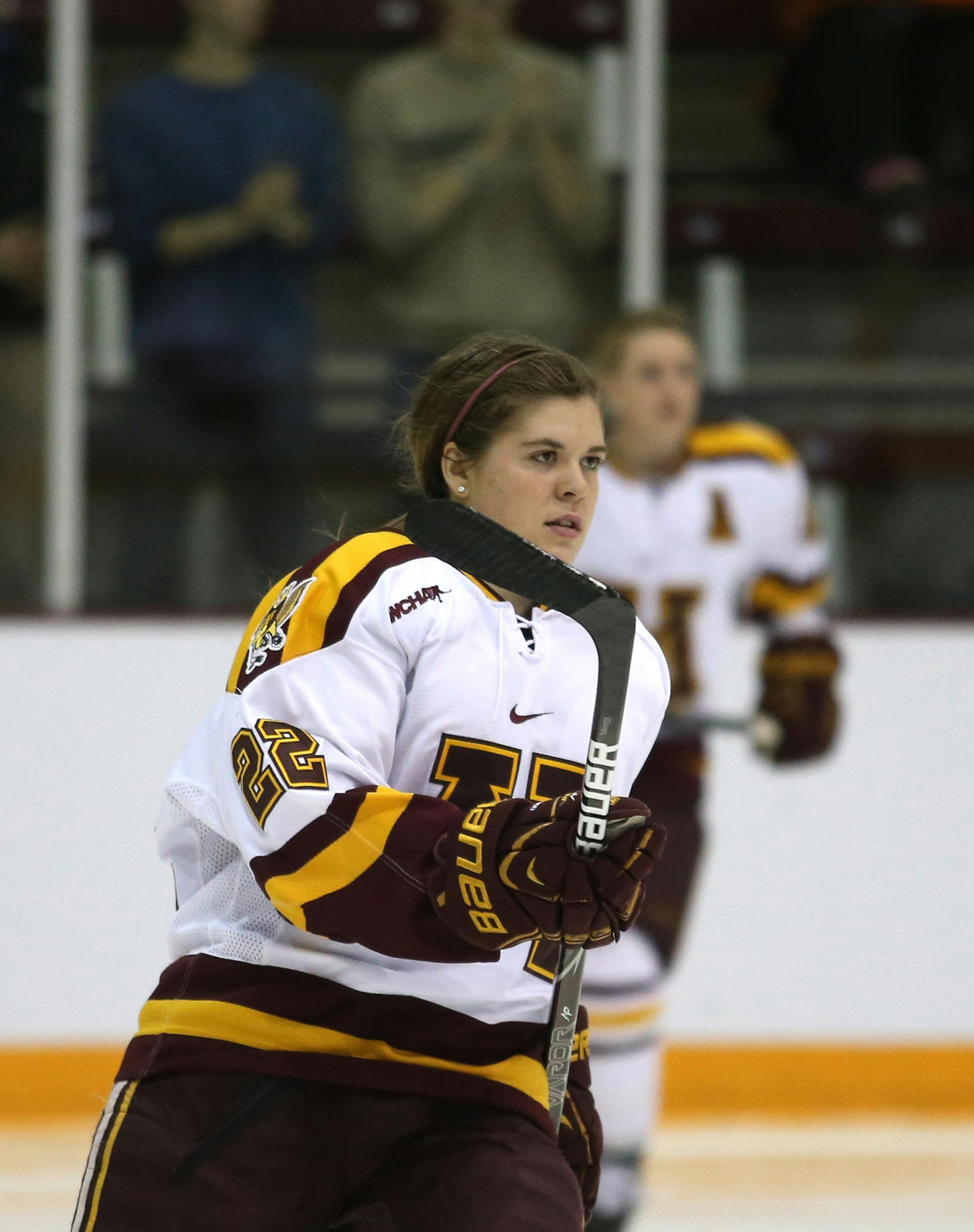 Gopher Hannah Brandt smiling before the game as she talked to teammates ] (KYNDELL HARKNESS/STAR TRIBUNE) kyndell.harkness@startribune.com Gopher women's hockey played Boston University in the quarterfinals of the NCAA championship at Ridder Arena in Minneapolis, Min, Saturday March 15, 2014. Gophers won over Boston University 5-1.