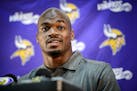 Vikings running back Adrian Peterson spoke at a news conference after Head Coach Mike Zimmer spoke. The two barely got together at the podium.