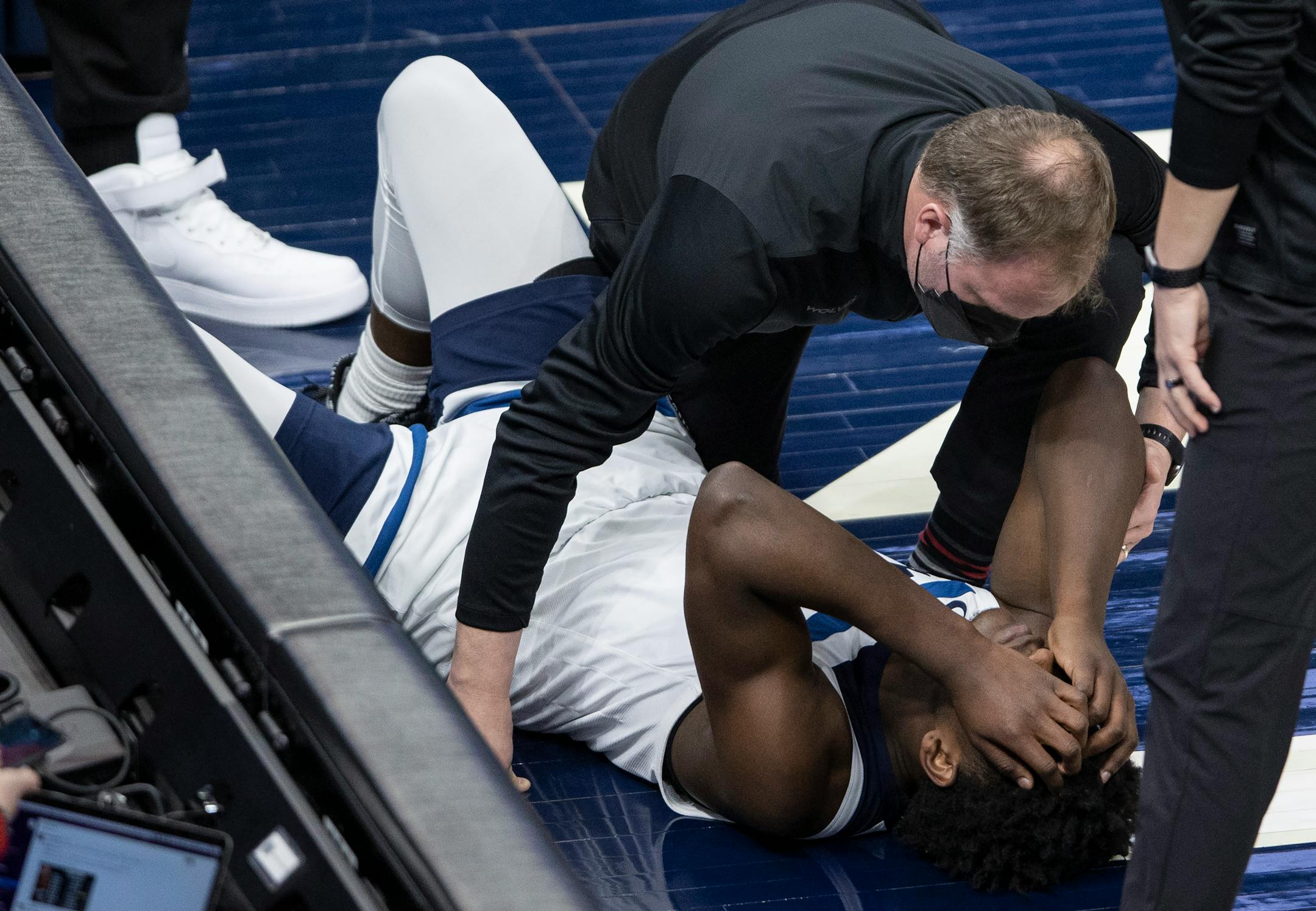 Anthony Edwards (1) ) of the Minnesota Timberwolves was attended to after being hurt on a play in the third quarter.