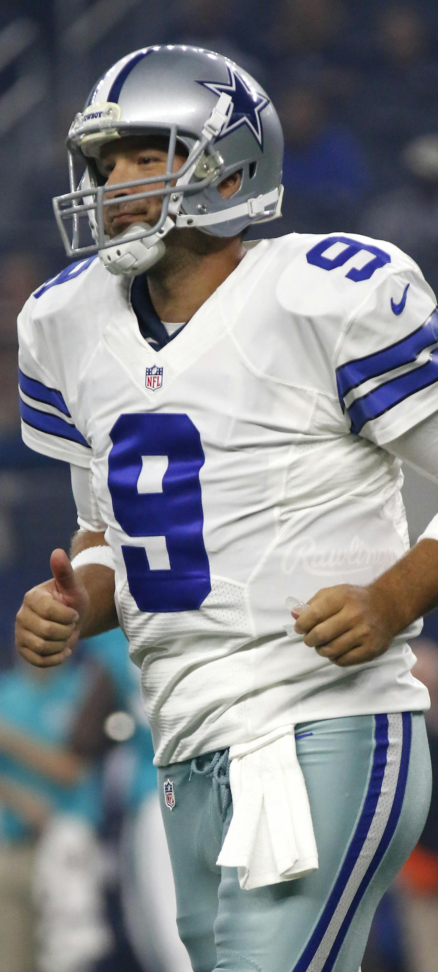 Dallas Cowboys' Tony Romo jogs across the field during an NFL preseason football game against the Miami Dolphins on Friday, Aug. 19, 2016, in Arlington, Texas. (AP Photo/Roger Steinman)