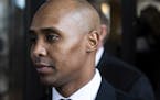 Former Minneapolis police officer Mohamed Noor leaves the Hennepin County Government Center after the first day of trial in Minneapolis on Monday, Apr