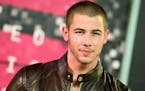 Nick Jonas arrives at the MTV Video Music Awards at the Microsoft Theater on Sunday, Aug. 30, 2015, in Los Angeles.