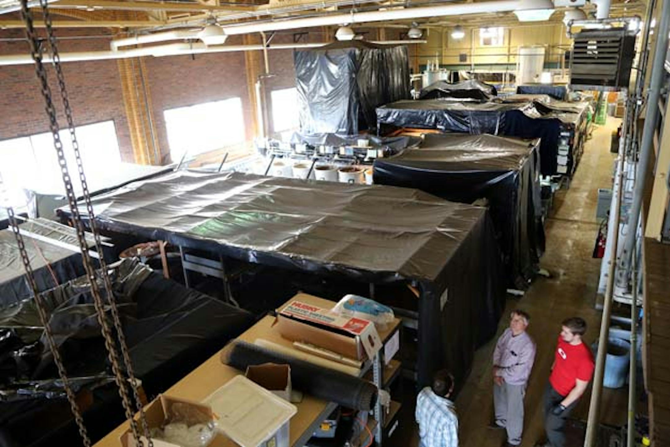 Sensitive to light, carp swimming in as many as four dozen tanks at the Minnesota Aquatic Invasive Species Research Center at the U are kept in the dark. The center's labratory is expected to be rebuilt with funding passed in the session just ending by the Legislature.