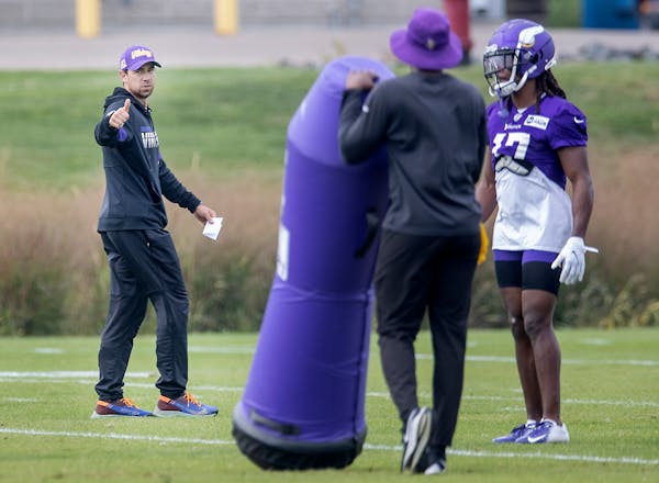 Vikings offensive coordinator Klint Kubiak, left, draws influences from several coaches, including his father, Gary, and Browns coach Kevin Stefanski,