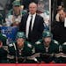 Minnesota Wild interim Head Coach Dean Evason watched from the bench in the second period.
