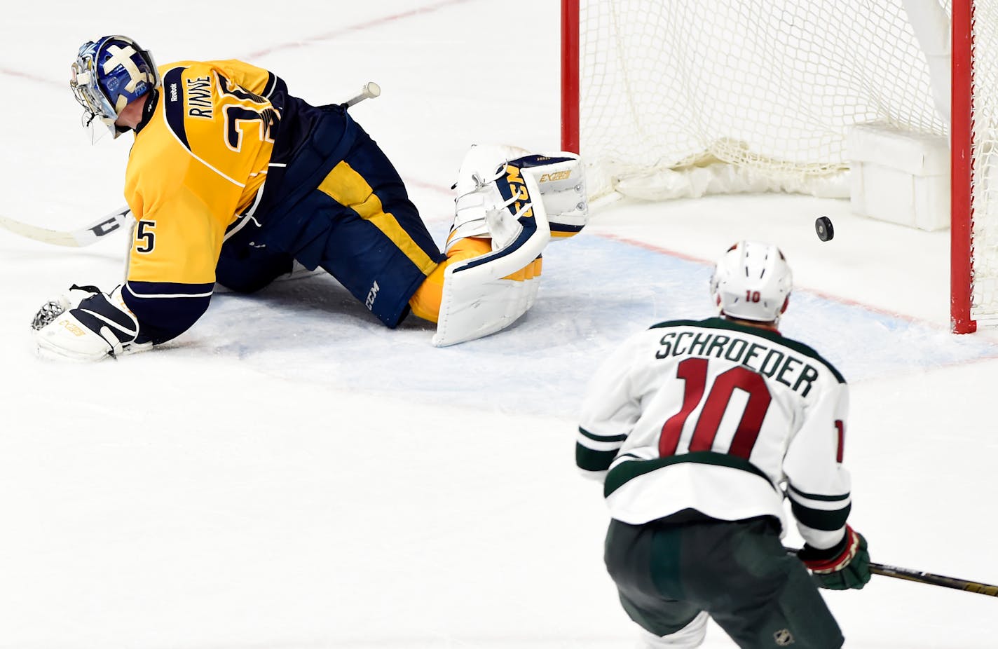 Wild center Jordan Schroeder watched a shot by defenseman Jared Spurgeon get past Predators goalie Pekka Rinne in overtime for a 3-2 victory. Schroeder had an assist on the play.