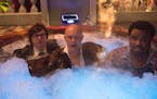 In this image released by Paramount Pictures/MGM, Clark Duke, from left, Rob Corddry and Craig Robinson appear in a scene from "Hot Tub Time Machine 2
