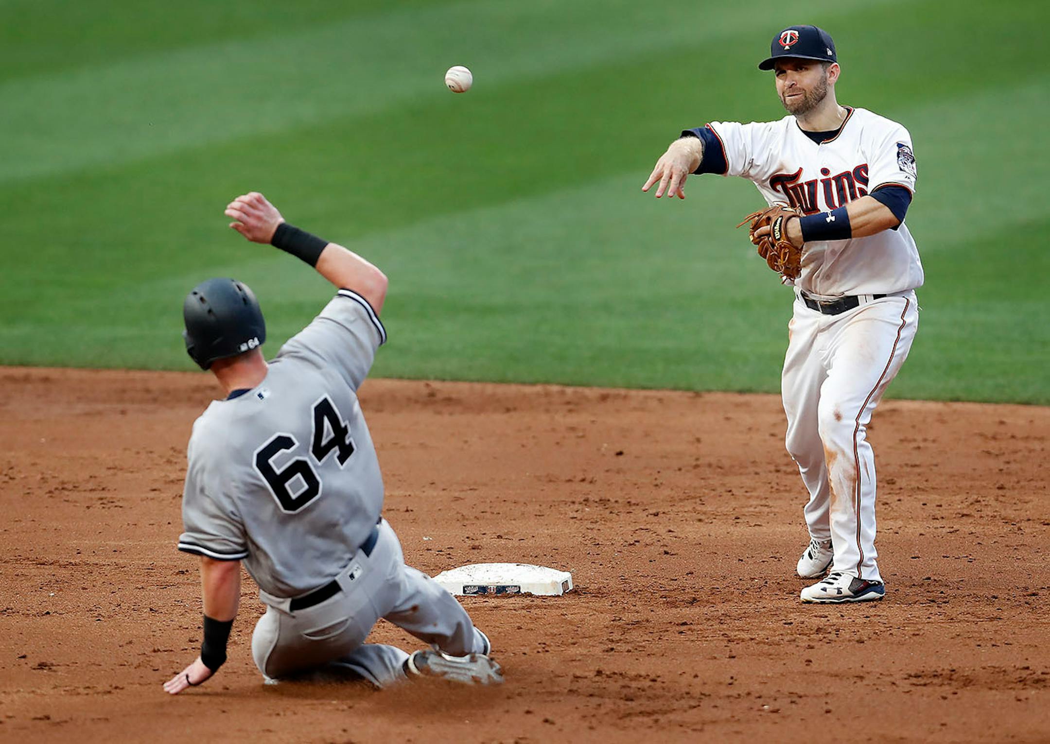 Minnesota Twins second baseman turned a double play in the third inning.
