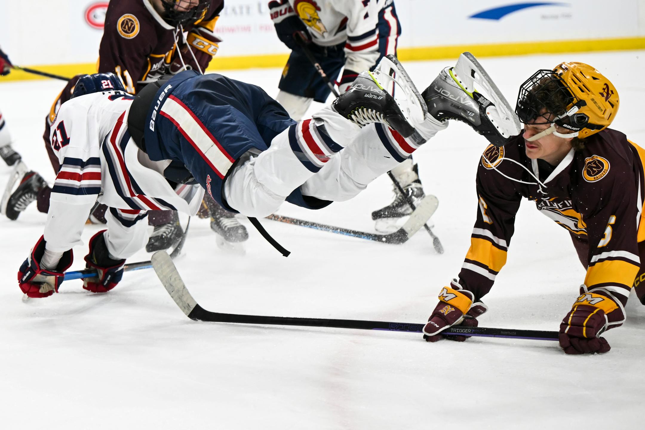 Orono forward Bradley Walker (21) and Northfield defenseman Bridger Riley (4) collide during the second period.