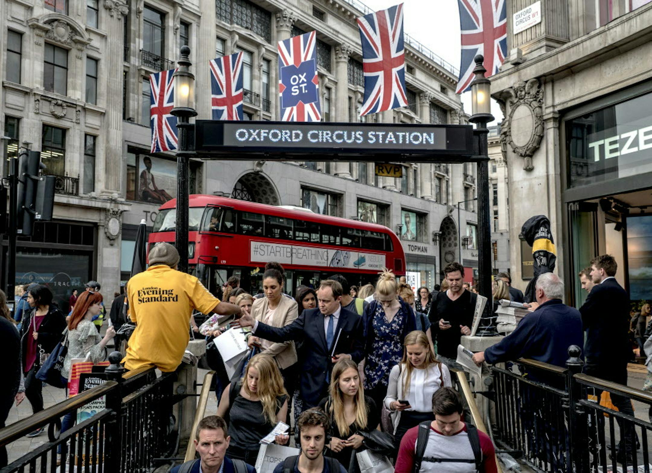 A crowd of people heading into the Oxford Circus Station in London, June 27, 2016. Leaders on both sides of the ìBrexitî debate signaled that they wanted continued access to the free-trade zone, though the European Union may have other ideas. (Andrew Testa/The New York Times)