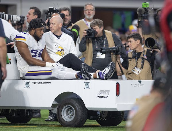 D.J. Wonnum of the Vikings was carted off the field Sunday after a season-ending injury.