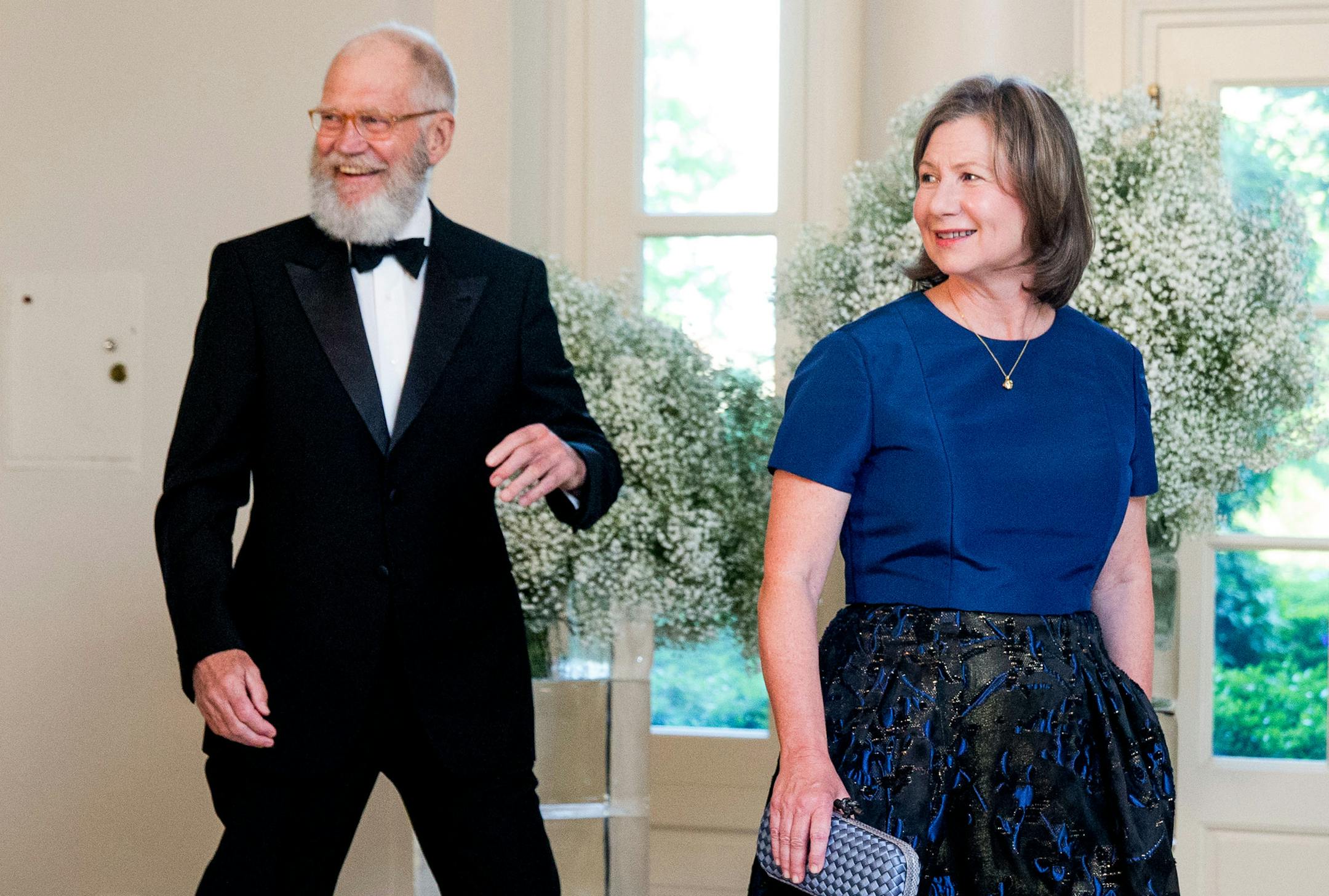 Retired late night host David Letterman and his wife Regina Lasko arrive for a state dinner for Nordic leaders at the White House in Washington, Friday, May 13, 2016. Nordic leaders are at the White house for a U.S.-Nordic Summit on security and economic issues followed by a State Dinner. (AP Photo/Andrew Harnik)