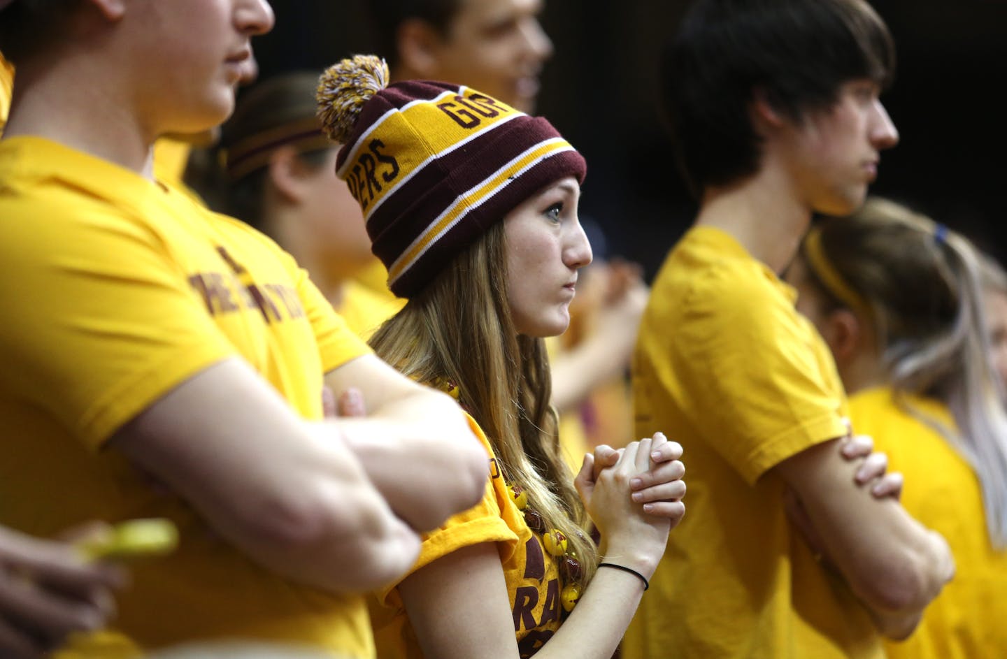 Gopher fan Annamarie Rutledge watched the action on the court in the first half against High Point. ] (KYNDELL HARKNESS/STAR TRIBUNE) kyndell.harkness@startribune.com First round of the National Invitational Tournament at Williams Arena in Minneapolis Min, Tuesday March 18, 2014.